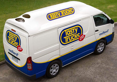 Tasty Trucks delivery van on the road